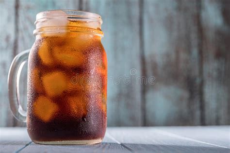 Mason Jar With Cold Brew Coffee And Straw Stock Photo Image Of Aroma