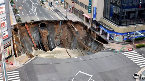 Giant Sinkhole Swallows Japanese Street Climate Crisis News Al Jazeera