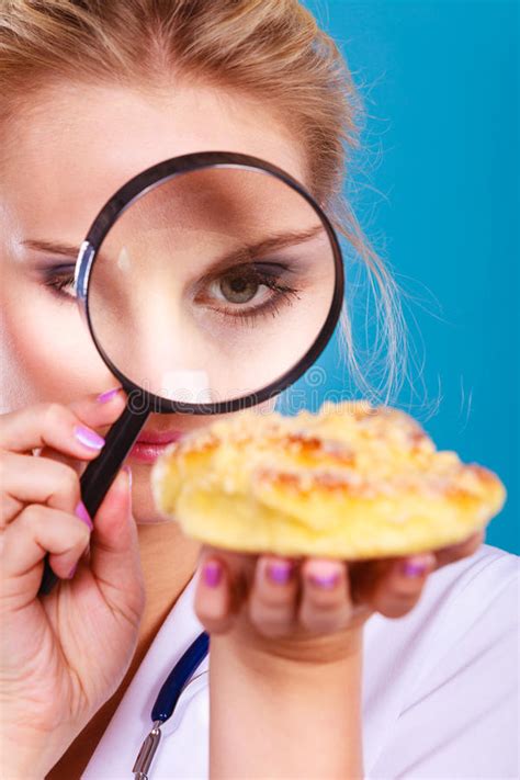 Woman Using Magnifying Glass To Examine Her Moles Skin Stock Image