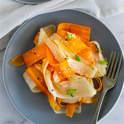 Daikon Carrot Salad With Sesame Ginger Dressing Babaganosh