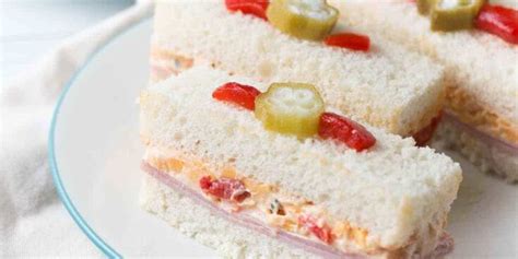 Ham And Pimento Cheese Tea Sandwiches With Pickled Okra Garnish