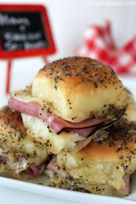In a bowl, mix together butter, dijon mustard, worcestershire sauce, poppy seeds, and dried onion. Ham and Swiss Sliders Recipe - CincyShopper