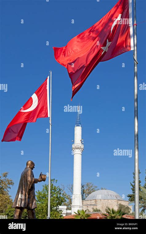 Atatürk Statue minaret and Turkish Flags at Dalyan Dalyan Delta