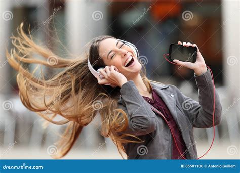Girl Dancing And Listening Music In The Street Stock Photo Image Of