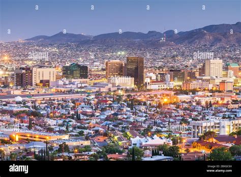 El Paso Texas Usa Downtown City Skyline At Dusk With Juarez Mexico