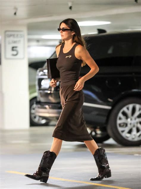 Kendall Jenner Wears A Chocolate Brown Skirt And Cowbabe Boots
