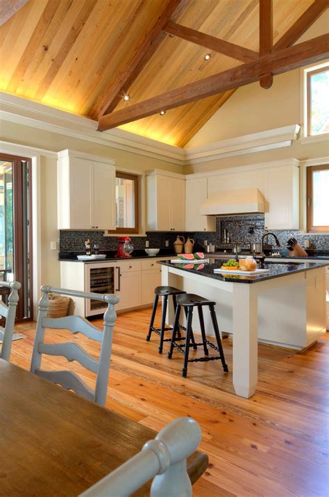 Faux wood ceiling beams are a great way to add character and warmth to a plain room. Lowcountry Architect: Crosby Residence Dog Trot