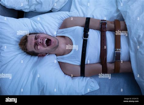 Man Tied Bed Hi Res Stock Photography And Images Alamy