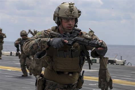 Recon Marines Fast Rope From An Mh 60s Aboard The Uss Wasp