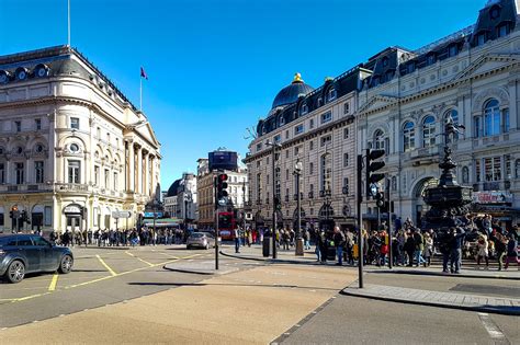 Piccadilly Circus In London A Historic Meeting Place Surrounded By