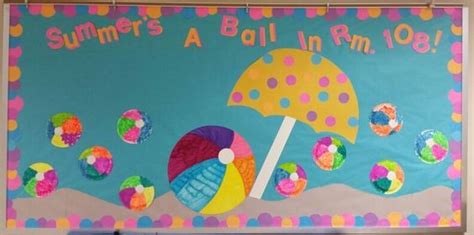A Bulletin Board With An Umbrella Beach Ball And Polka Dot Dots On It