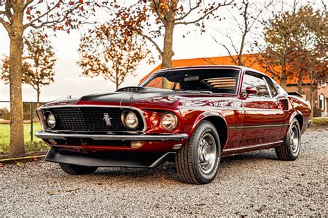 Rev Up Your Style With The Timeless Classic Ford Mustang Mach Cars Muscular Vehicle