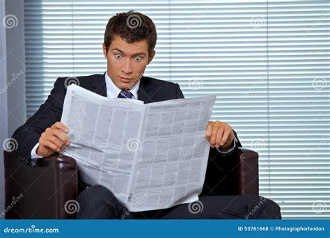 Businessman Reading Newspaper In Office Stock Photo Image Of Length