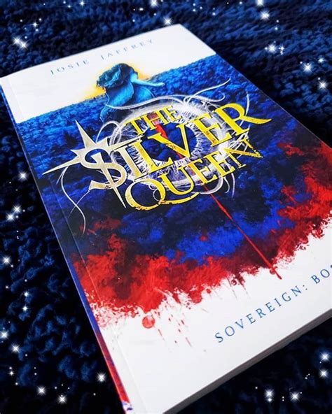 A Book With An Image Of A Blue Bird On It And Stars In The Background