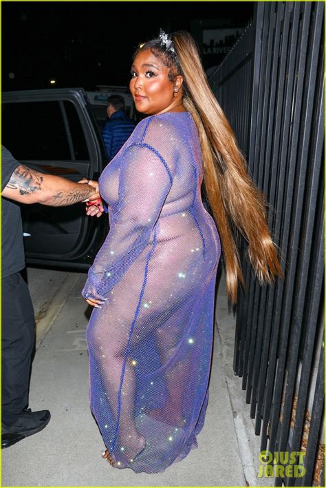 Lizzo Calls Out Critics And Trolls Hating On Her Purple Sheer Dress
