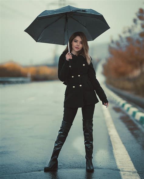 Woman Standing On A Road Holding An Umbrella Standing Poses Poses Model Poses
