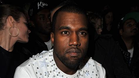 Kanye West Charged Over Alleged Paparazzi Attack