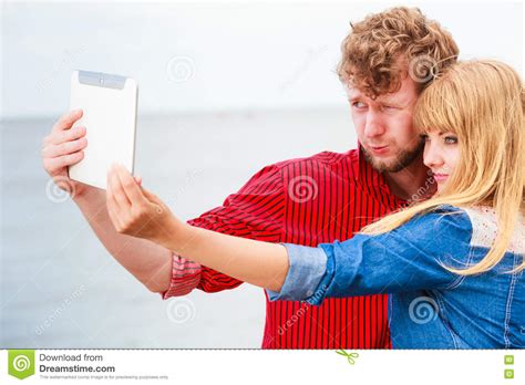 Young Couple Taking Self Picture Selfie With Tablet Stock Image Image Of Happiness Young