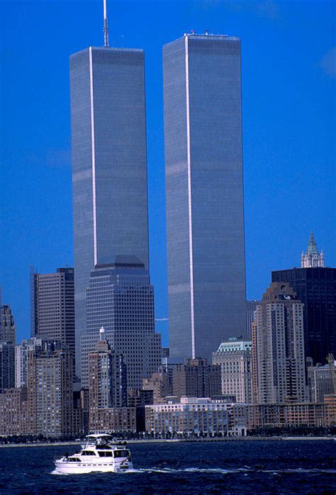 The twin towers were 1 world trade center and 2 world trade center. Twin Towers In New York City by Carl Purcell