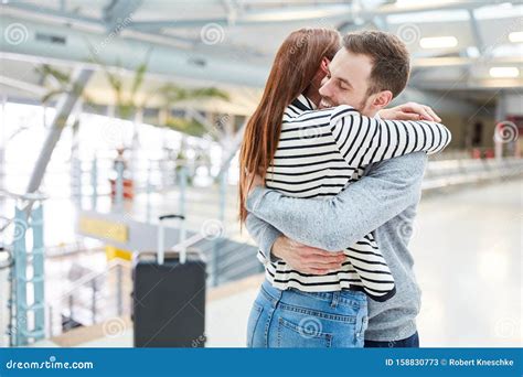 Young Couple Hugging Each Other At The Airport Stock Image Image Of Couple Railroad 158830773