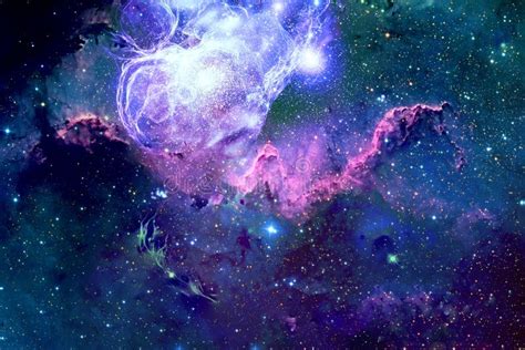 A Beautiful Nebula Of Different Colors With Stars And Galaxies