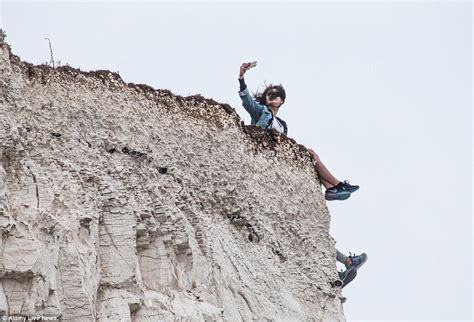Seven Sisters Sightseer Takes Selfie On Dangerous Cliff Daily Mail Online