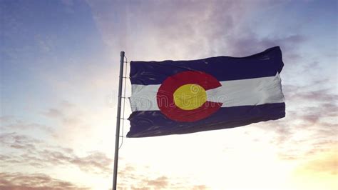 Colorado Flag On A Flagpole Waving In The Wind In The Sky State Of
