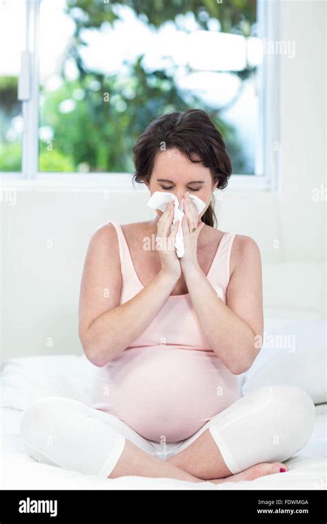 Pregnant Woman Sitting On Bed Stock Photo Alamy