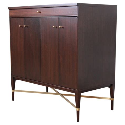 Shop for vintage cabinets & storage at auction from paul mccobb, starting bids at $1. Paul McCobb Calvin Group Mahogany and Brass Sideboard or ...
