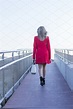 Blonde woman walking away over the r | High-Quality People Images ...