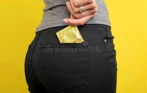Woman Putting Condom In Pocket Stock Image Image Of Pocket Safe