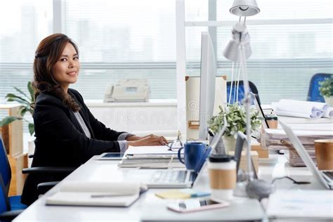 Female Entrepreneur Working On Computer Stock Photo Image Of