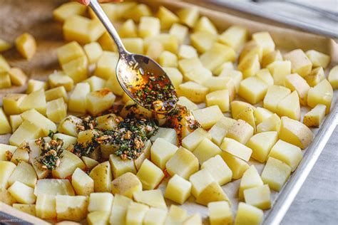 Garlic Roasted Potatoes Recipe Roasted Potatoes In Oven — Eatwell101
