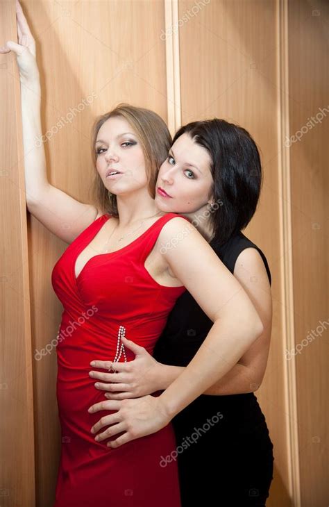 Two Beautiful Girls Hugging Each Other Stock Photo By Leukocheat
