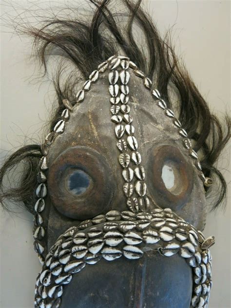 African Dan Mask With Cowrie Shells Mirrors And Hair