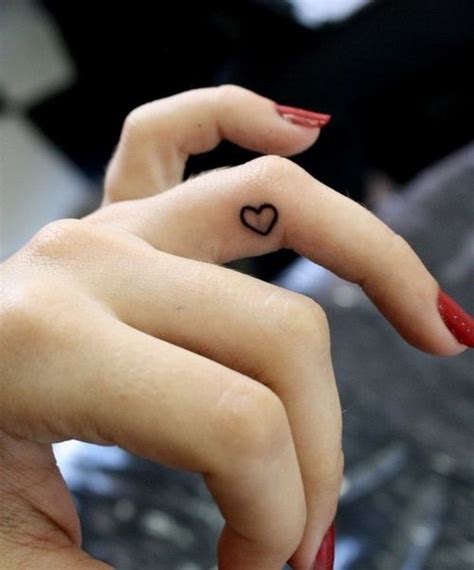 Pretty Heart Tattoo On The Ring Finger Tattoos
