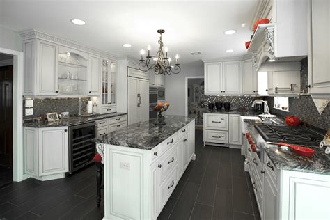 Incorporating colored cabinets in a kitchen creates a striking and very custom feel to the space. Black and White Kitchen Middletown New Jersey by Design ...