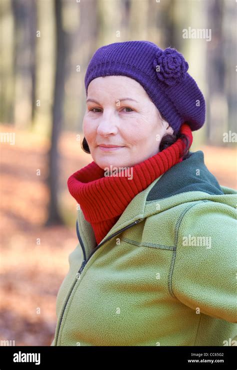 Portrait Of An Attractive 50 Year Old Woman Spending Time Outdoors