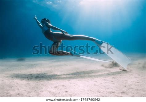 Attractive Woman Freediver Glides Posing Over Stock Photo