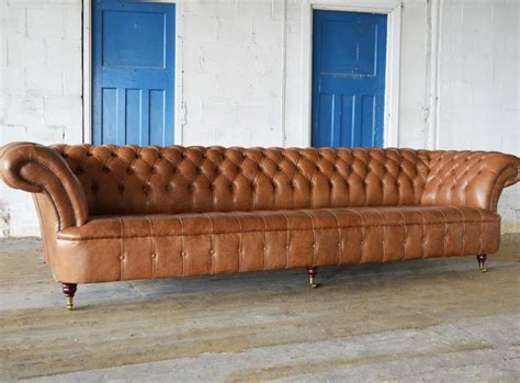 The traditional chesterfield leather sofa features elegantly rolled arms and beautiful tufting. Windermere Leather Chesterfield Sofa | Abode Sofas