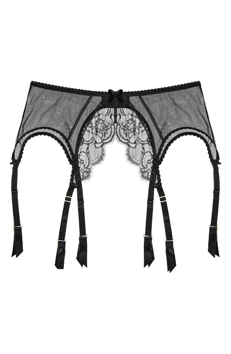 master the art of seduction in this garter belt that looks barely there with panels of sheer