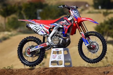Reserves the right to make changes at any time, without notice or obligation, in colours, specifications, accessories, materials and models. Racing Cafè: Honda CRF 450RW Team HRC MXGP 2015