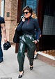 Kris Jenner dons glossy green leather pants in NYC with companion Corey ...