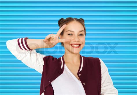 Happy Smiling Teenage Girl Showing Peace Sign Stock Image Colourbox