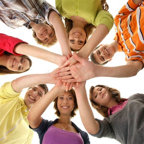 A Group Of Young Teenages Holding Hands Together Stock Image Image Of