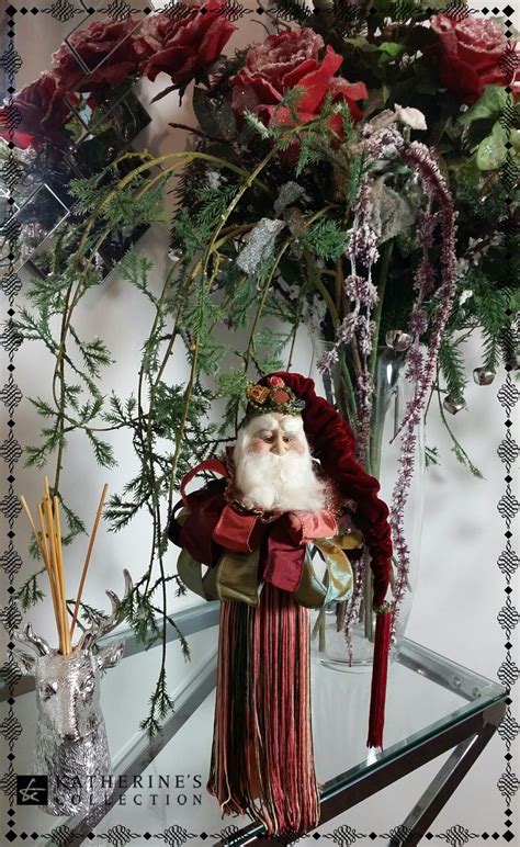 why not dress your home this christmas season with our lavish santa wine tassel display