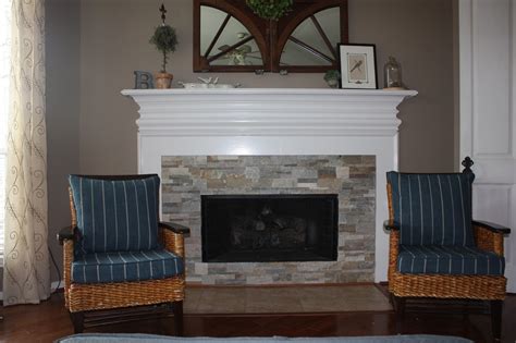 For drama, the fireplace goes up to the ceiling. Header: New Stacked Stone Fireplace Surround