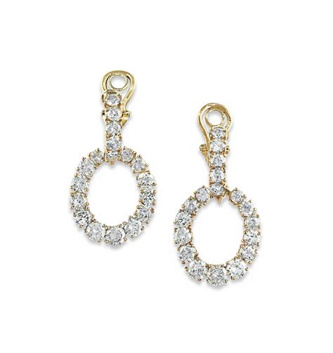 A PAIR OF DIAMOND EARRINGS Christie S