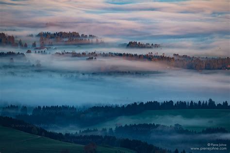 Fog Leaping Over The Lower Parts Of The Allgäu Bavaria Germany