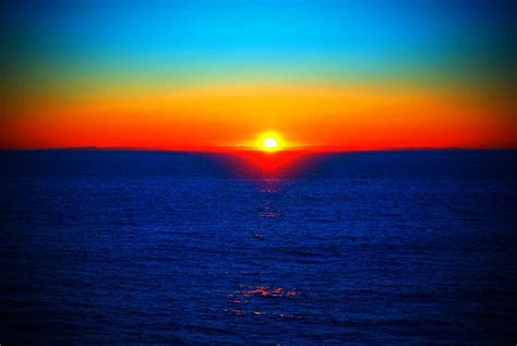 Blue And Orange Sunset Over The Ocean Flickr Photo Sharing